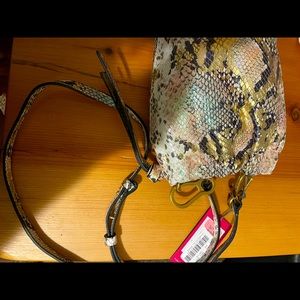 Vince Camuto Drawstring Leather pouch purse.